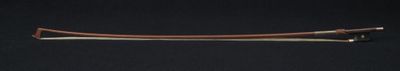 an image of a wooden and metal pipe on a black background