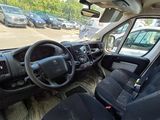 a view of the inside of a vehicle from the driver ' s seat