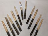 six different types of brushes are lined up in a circle