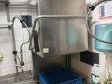 a kitchen with a sink and a dishwasher in it