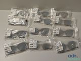 a lot of glasses that are sitting on a table