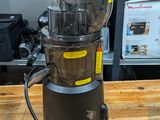 a blender that is sitting on a wooden table