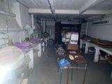 an image of a room with a lot of tables and chairs