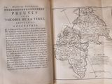 an open book with a map of the world on it