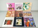 a lot of music books on a table