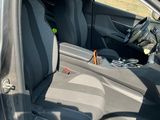 a car with the door open and the seats down