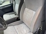 two seats in the back of a van with no one in it