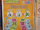 a box of multi - colored cards on display in a store