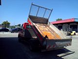 a truck that has a ramp on the back of it