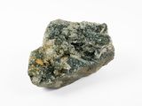 a close up of a piece of rock on a white surface