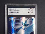 a close up of a pokemon card on a table