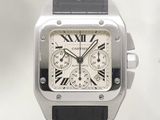 a close up of a watch with roman numerals on the face