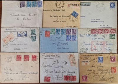 many different types of letters and envelopes on the table