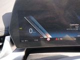 the dashboard of a car with a digital display on it