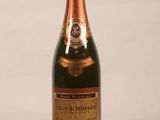 a bottle of champagne that is sitting on a table