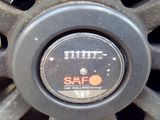 a close up of a car tire with a saf logo on it