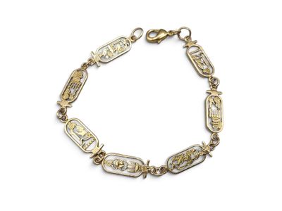 a close up of a bracelet on a white background