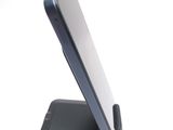a close up of a cell phone on a stand