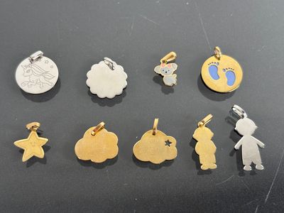 a close up of a bunch of charms on a table