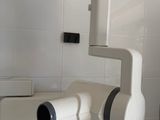 a bathroom with a sink, toilet, and a shower
