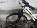 a bike that is parked next to a wall