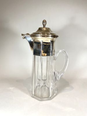 Carafe à orangeade en cristail taillé et monture en argent 9…