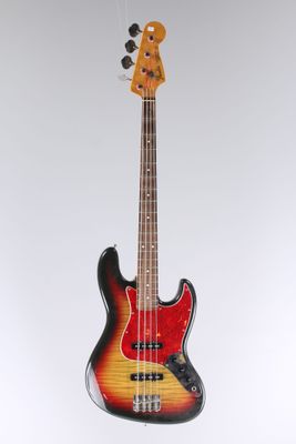 a close up of a bass guitar on a white background