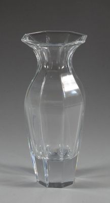 a glass vase that is sitting on a table