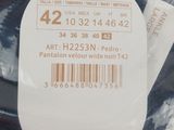 a close up of a pair of shoes with tags on them