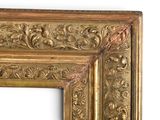 an image of a gold frame with a decorative design on it