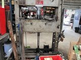 a large machine that is sitting in a garage