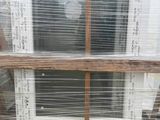 a window that has been wrapped in plastic to protect it from the sun