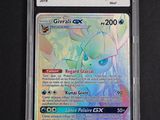 a close up of a pokemon card in a plastic case