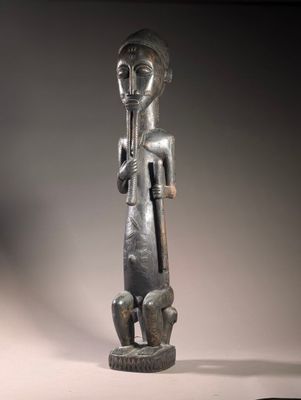 an image of a statue of a man with a hat on his head