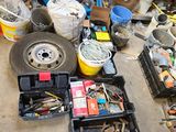 a lot of assorted tools and tools in a garage