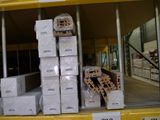 many boxes on the shelf in the store for sale