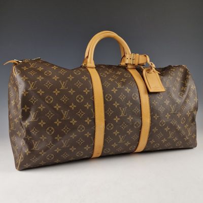 louis vuitton keepall bag in monogram canvas and leather