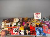 a lot of records on a table with a lot of them