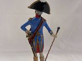 figurine of a man in a blue uniform with a hat and cane