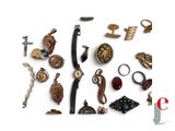 many different types of jewelry on a white surface
