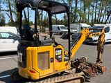 a bulldozer that is parked in the parking lot