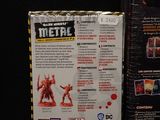a box with a picture of a red demon on it