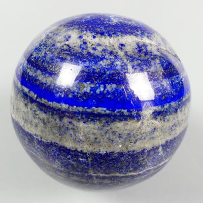 blue and white marble ball on a white background