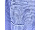 a close up of a blue sweater with a pocket