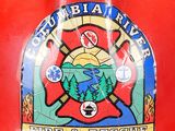 a red hard hat with a fire and rescue emblem on it