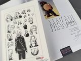 an image of a book with a drawing of a woman ' s face and a man ' s head