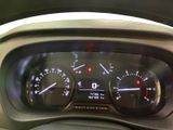 a close up of a car dashboard with a speedometer and gauges