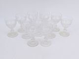 a lot of empty wine glasses sitting on a table