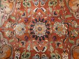 a close up of a rug with many different colors