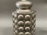 a close up of a lamp on a table